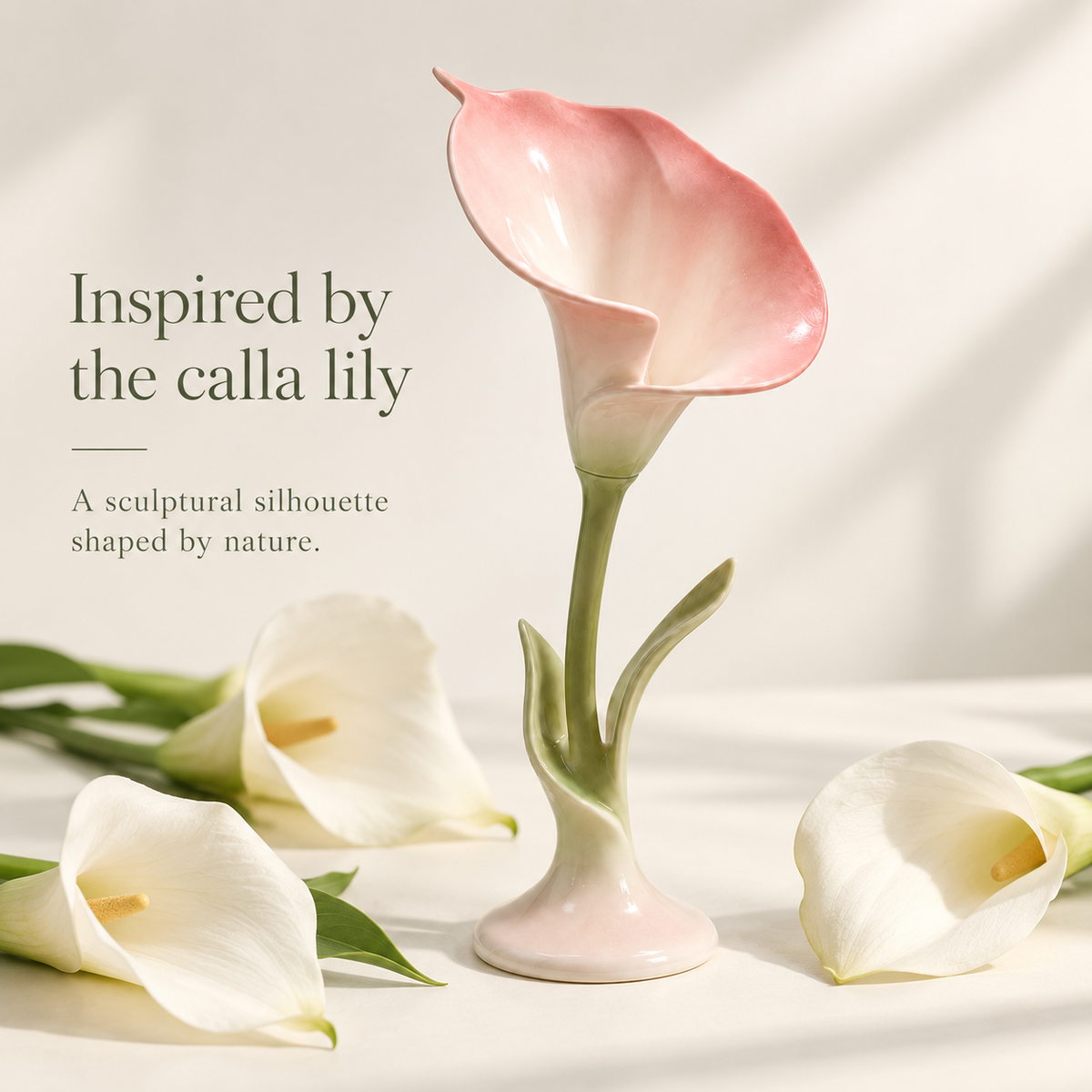 Ceramic calla lily candle holder styled with fresh white calla lilies to show its floral inspiration.